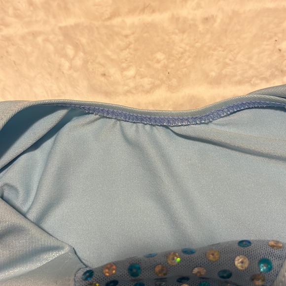 No size. I think it’s 5-6x sparkles blue ballerina outfit for gymnastics - Picture 4 of 4